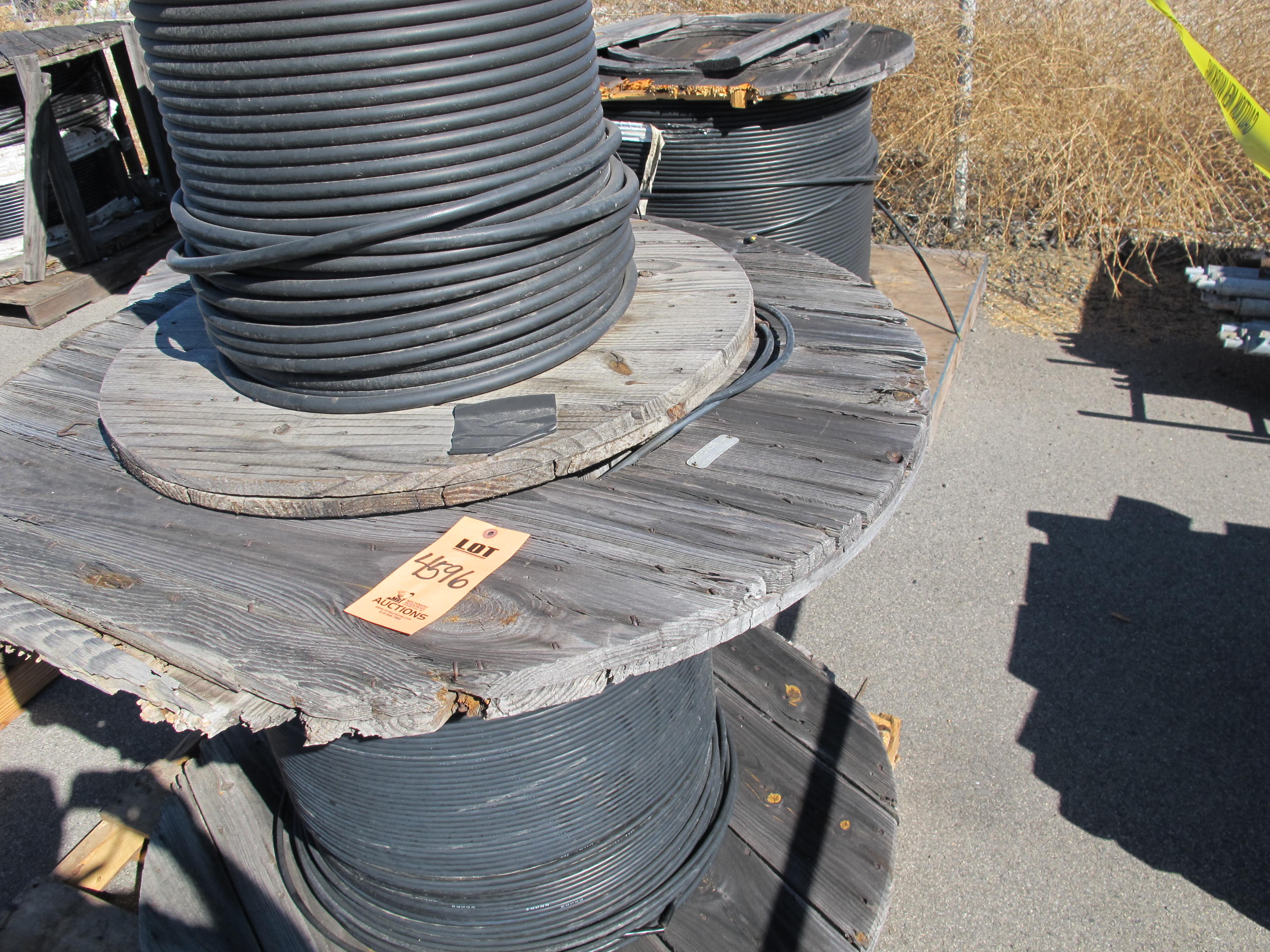 (16 SPOOLS) VARYING SIZES OF TELECOM CABLE. LOADING & HANDLING FEE $30-4596